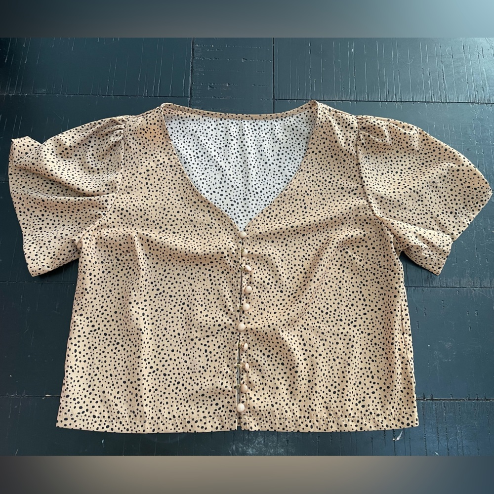 Light brown polka dot button down women’s top
